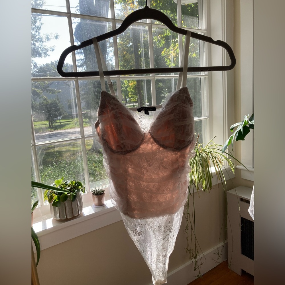 White ruched lace bodysuit.